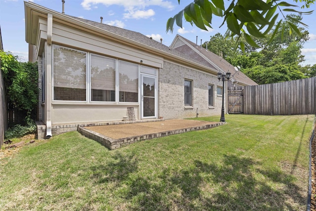 back of house featuring brick siding