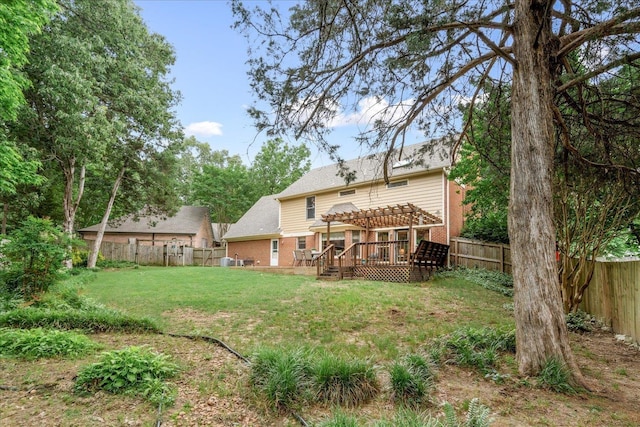 7733 Quick Fox Cv, Memphis, TN 38016 - back of property with a pergola, brick siding, and a wooden deck