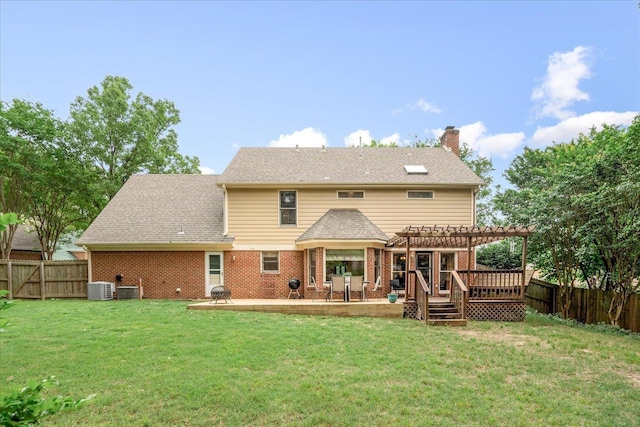 7733 Quick Fox Cv, Memphis, TN 38016 - back of house with a pergola, a chimney, a deck, brick siding, and central AC