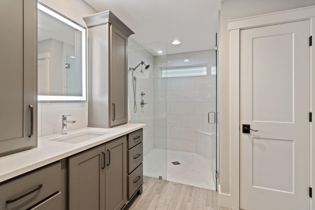 787 Pearson Oaks Dr, Collierville, TN 38017 - full bath featuring a stall shower, wood finished floors, vanity, and recessed lighting