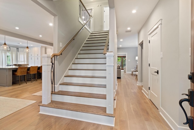 787 Pearson Oaks Dr, Collierville, TN 38017 - stairway featuring wood finished floors, recessed lighting, and baseboards