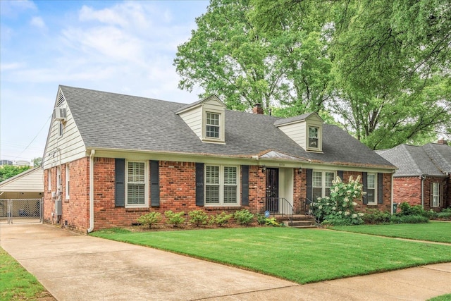 1079 Woodview Dr, Memphis, TN 38117 - cape cod home with brick siding, a chimney, a front lawn, and a shingled roof