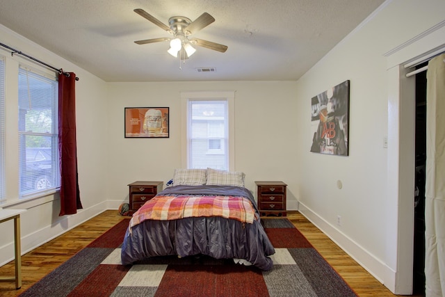 1975 Walker Ave, Memphis, TN 38104 - bedroom featuring wood finished floors, baseboards, and ceiling fan