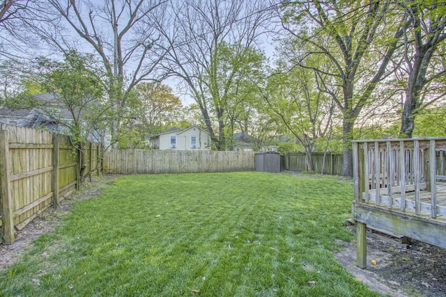 1975 Walker Ave, Memphis, TN 38104 - view of yard with a shed, an outdoor structure, and a deck