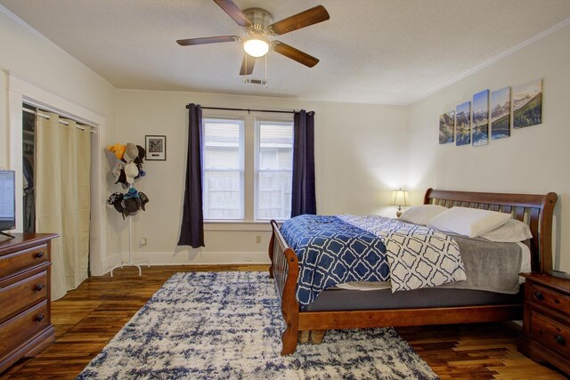 1975 Walker Ave, Memphis, TN 38104 - bedroom featuring wood finished floors, baseboards, a ceiling fan, and a closet