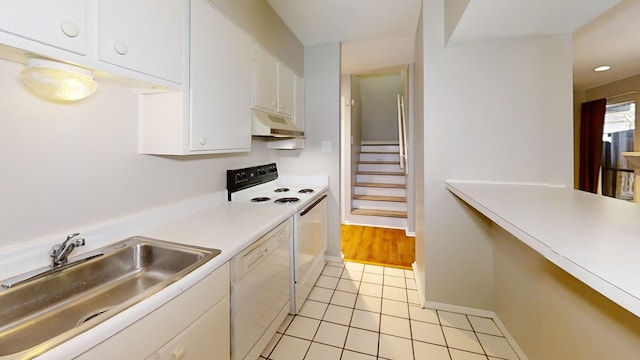 3983 Grahamdale Cir Unit 3983B, Memphis, TN 38122 - kitchen featuring white dishwasher, electric range, a sink, under cabinet range hood, and white cabinets