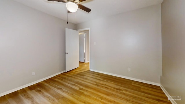 3983 Grahamdale Cir Unit 3983B, Memphis, TN 38122 - unfurnished room with a ceiling fan, light wood-style floors, and baseboards