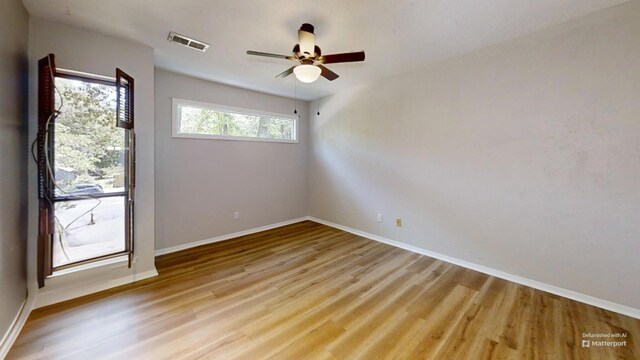 3983 Grahamdale Cir Unit 3983B, Memphis, TN 38122 - empty room featuring baseboards, wood finished floors, and ceiling fan