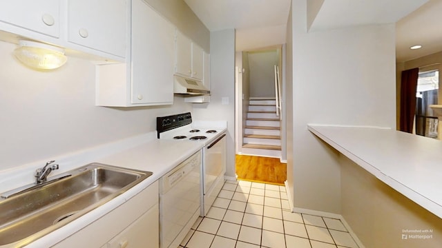 3983 Grahamdale Cir Unit 3983B, Memphis, TN 38122 - kitchen with dishwasher, range with electric stovetop, under cabinet range hood, a sink, and white cabinets