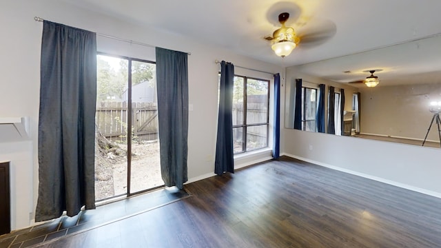 3983 Grahamdale Cir Unit 3983B, Memphis, TN 38122 - unfurnished living room with ceiling fan, dark wood-style flooring, healthy amount of natural light, and baseboards