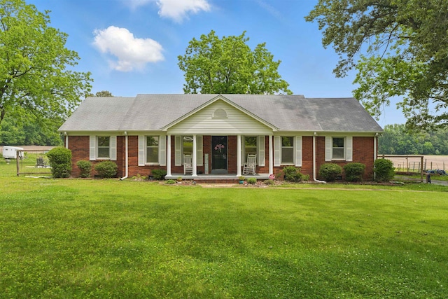 1980 Campbell Rd, Millington, TN 38053 - ranch-style house with a porch, a front yard, and brick siding