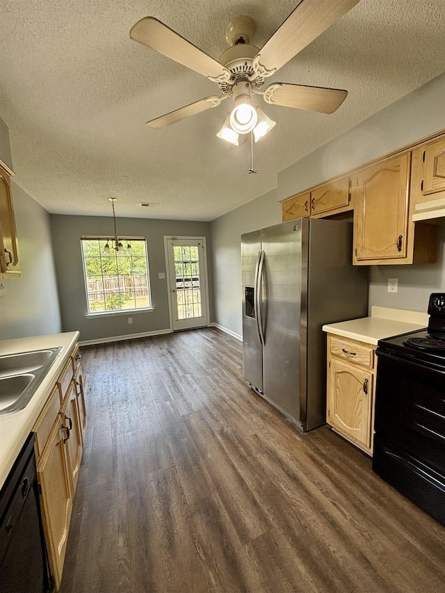 kitchen with black appliances, a textured ceiling, dark wood-type flooring, light countertops, and ceiling fan