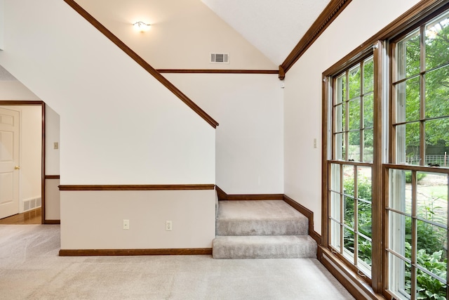9234 Fletcher Trace Pkwy, Lakeland, TN 38002 - stairs with carpet floors, vaulted ceiling, and baseboards
