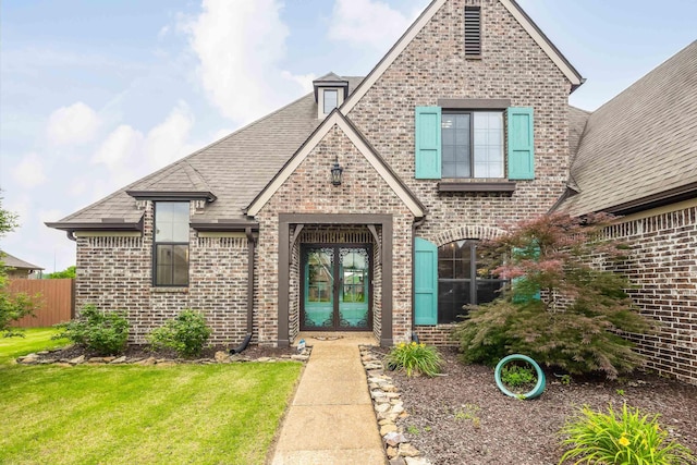 13525 Lapstone Loop, Olive Branch, MS 38654 - view of front of home featuring brick siding, roof with shingles, and french doors