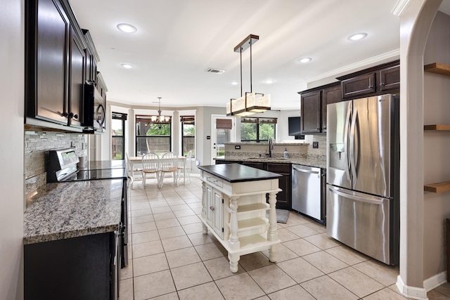 13525 Lapstone Loop, Olive Branch, MS 38654 - kitchen featuring appliances with stainless steel finishes, a sink, crown molding, open shelves, and light tile patterned flooring