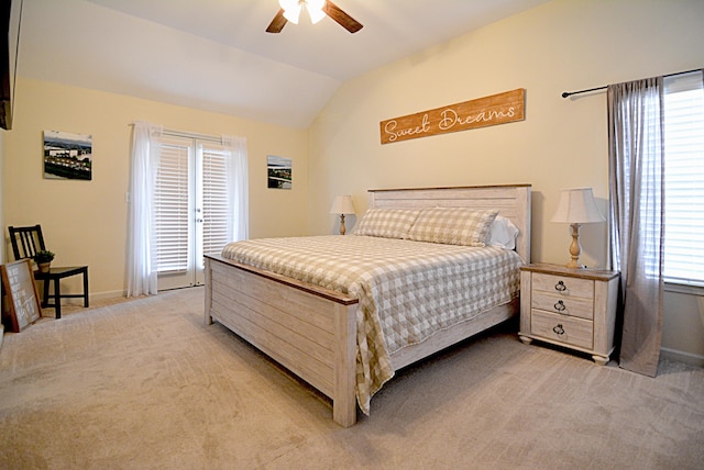 1342 Harbor Park Dr, Memphis, TN 38103 - bedroom featuring light colored carpet, vaulted ceiling, baseboards, and a ceiling fan
