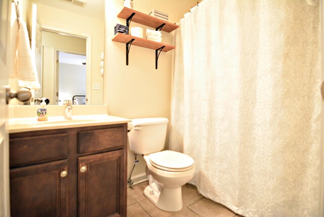 1342 Harbor Park Dr, Memphis, TN 38103 - full bathroom featuring tile patterned floors, toilet, and vanity
