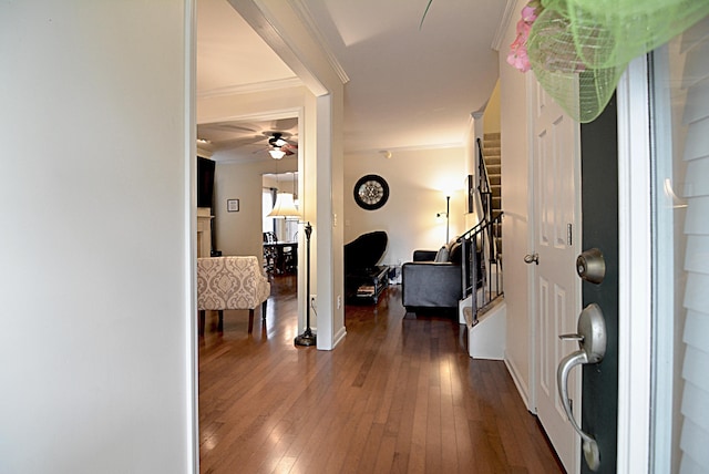 1342 Harbor Park Dr, Memphis, TN 38103 - foyer entrance with ornamental molding, ceiling fan, wood-type flooring, baseboards, and stairway