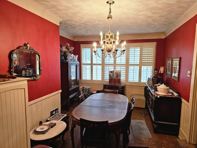 1993 Higbee Ave, Memphis, TN 38104 - dining area with a chandelier, wainscoting, and wooden walls