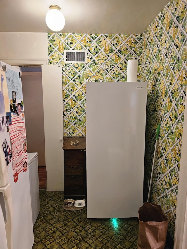 1993 Higbee Ave, Memphis, TN 38104 - interior space with freestanding refrigerator