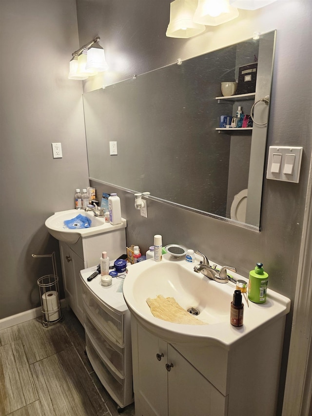 1993 Higbee Ave, Memphis, TN 38104 - bathroom with vanity and wood finished floors