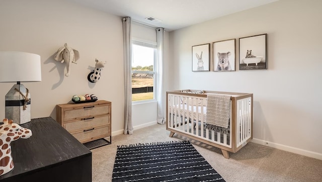 8005 Royster Creek Dr E, Millington, TN 38053 - bedroom with carpet flooring, baseboards, and a nursery area