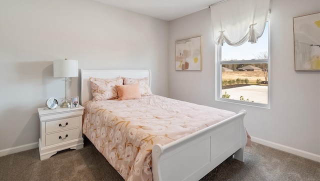 8005 Royster Creek Dr E, Millington, TN 38053 - bedroom with dark colored carpet and baseboards