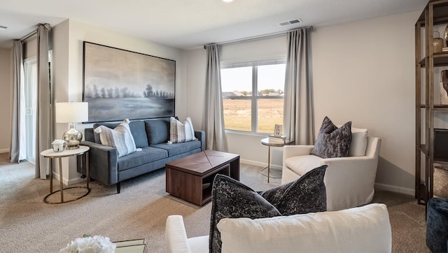 8005 Royster Creek Dr E, Millington, TN 38053 - living room featuring carpet floors and baseboards