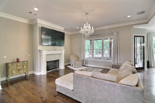 75 Windgrove Cv, Piperton, TN 38017 - living room featuring a chandelier, ornamental molding, wood finished floors, a fireplace, and baseboards