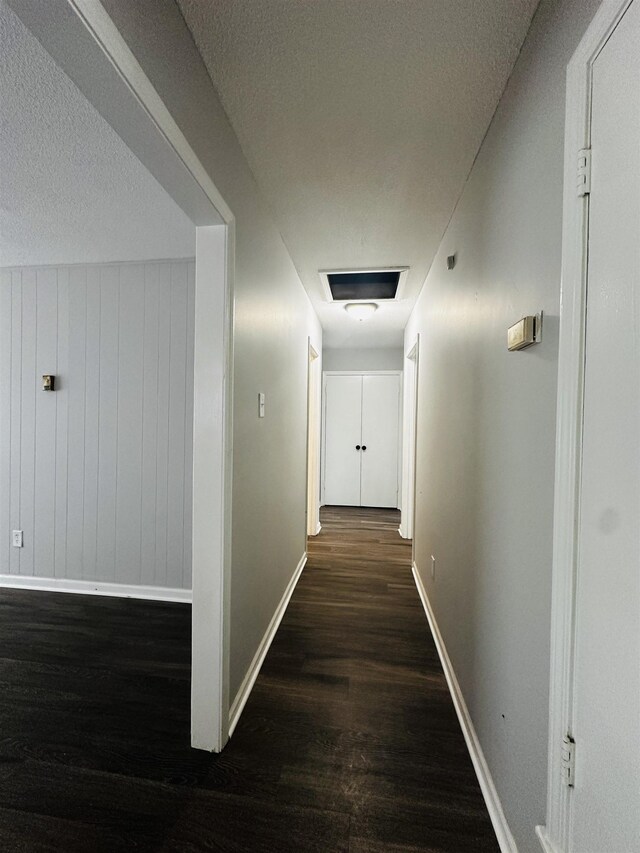 2232 Amethyst Cv, Memphis, TN 38127 - hallway with baseboards, wood finished floors, and a textured ceiling