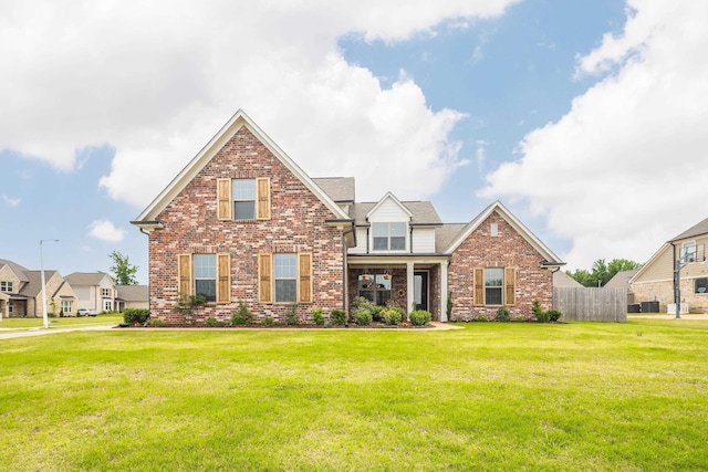 6423 Osier Cv, Bartlett, TN 38135 - view of front facade with brick siding and cooling unit