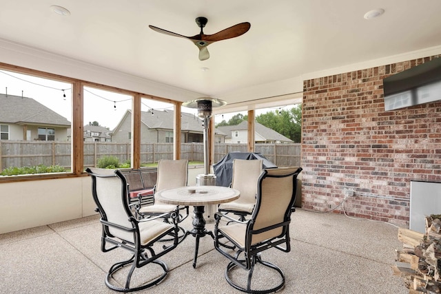 6423 Osier Cv, Bartlett, TN 38135 - sunroom / solarium featuring brick wall and ceiling fan