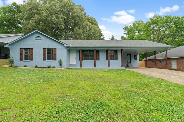 6410 Coteswood Rd, Memphis, TN 38134 - single story home with driveway, an attached carport, a front yard, and brick siding