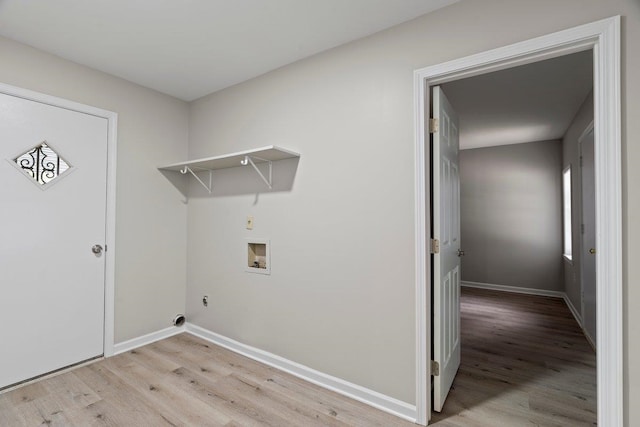 6410 Coteswood Rd, Memphis, TN 38134 - washroom featuring light wood-type flooring, washer hookup, baseboards, and hookup for an electric dryer