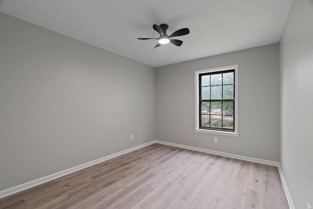 6410 Coteswood Rd, Memphis, TN 38134 - spare room featuring light wood-style floors, baseboards, and ceiling fan