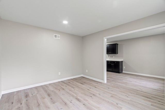 6410 Coteswood Rd, Memphis, TN 38134 - basement featuring light wood-style floors, baseboards, and recessed lighting