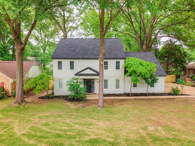 7238 Mcvay Rd, Germantown, TN 38138 - colonial home with a front yard and a shingled roof