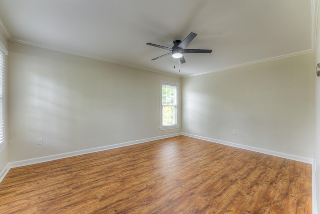 7238 Mcvay Rd, Germantown, TN 38138 - empty room with crown molding, ceiling fan, wood finished floors, and baseboards