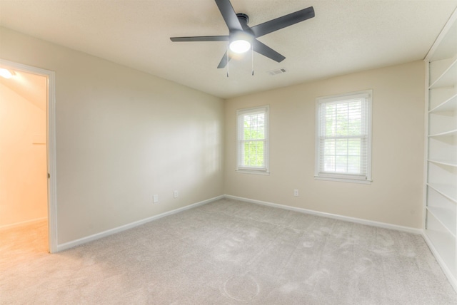 7238 Mcvay Rd, Germantown, TN 38138 - empty room with light carpet, a ceiling fan, and baseboards