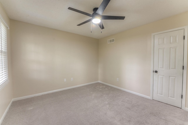 7238 Mcvay Rd, Germantown, TN 38138 - carpeted empty room with ceiling fan, baseboards, and plenty of natural light