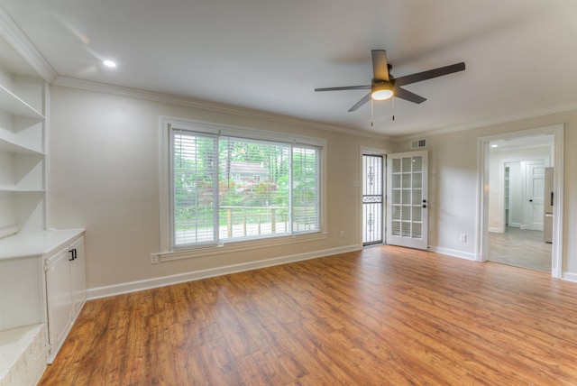 7238 Mcvay Rd, Germantown, TN 38138 - unfurnished living room featuring light wood-style flooring, ceiling fan, crown molding, and baseboards