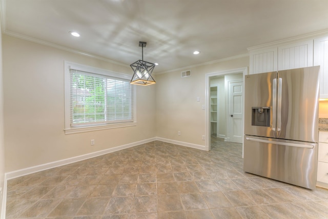 7238 Mcvay Rd, Germantown, TN 38138 - kitchen with stainless steel fridge, ornamental molding, white cabinets, recessed lighting, and baseboards
