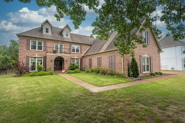 1796 Campden Dr, Collierville, TN 38017 - colonial house featuring french doors, brick siding, and a front lawn