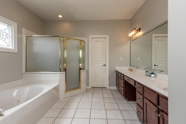 1796 Campden Dr, Collierville, TN 38017 - bathroom featuring double vanity, a tub with jets, a shower stall, and tile patterned floors