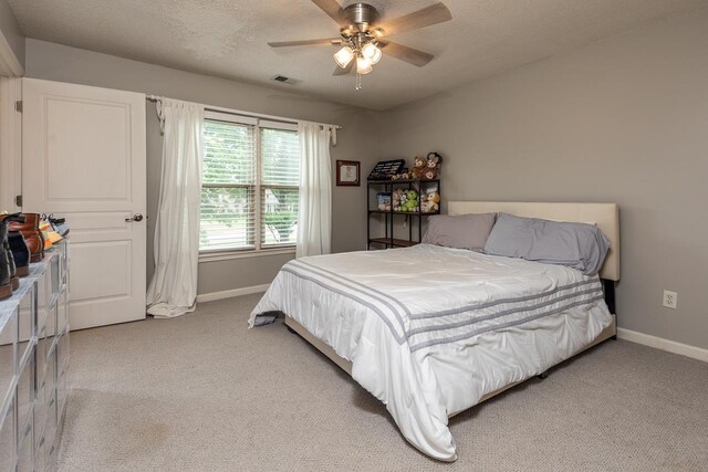 1796 Campden Dr, Collierville, TN 38017 - bedroom with baseboards, carpet floors, a textured ceiling, and a ceiling fan