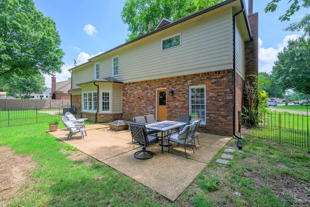 858 Gunnison Dr, Collierville, TN 38017 - rear view of house with brick siding and a patio area