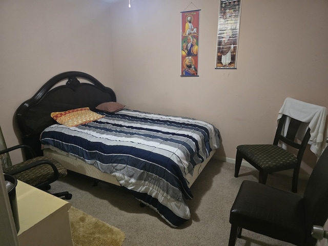 7129 Butternut Dr, Memphis, TN 38133 - carpeted bedroom featuring baseboards