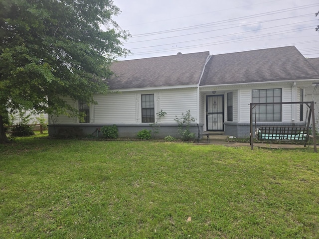 7129 Butternut Dr, Memphis, TN 38133 - view of front of home with a front yard, roof with shingles, and brick siding