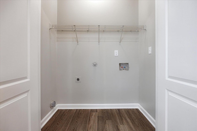laundry area featuring gas dryer hookup, dark wood-style flooring, washer hookup, electric dryer hookup, and baseboards