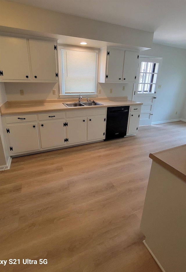 5551 Derron Dr, Memphis, TN 38115 - kitchen with black dishwasher, a sink, white cabinetry, baseboards, and recessed lighting